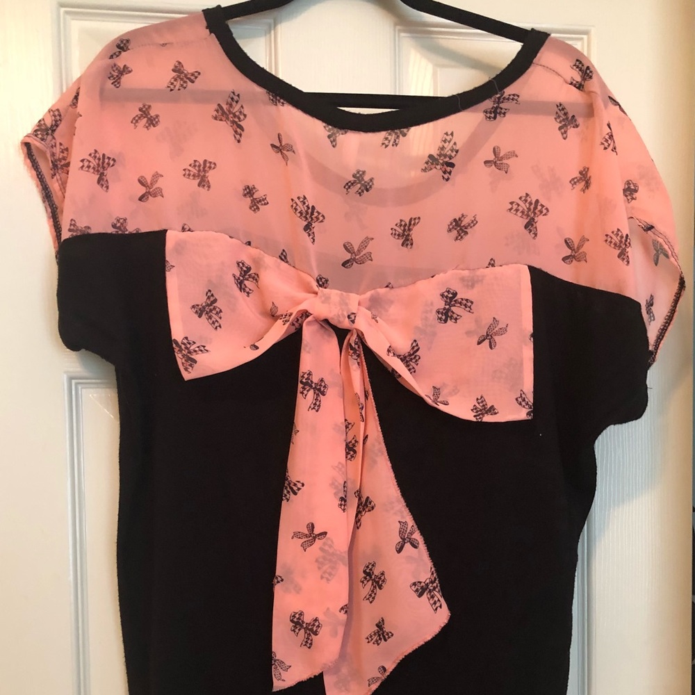 Pink and black curly top - bow on back